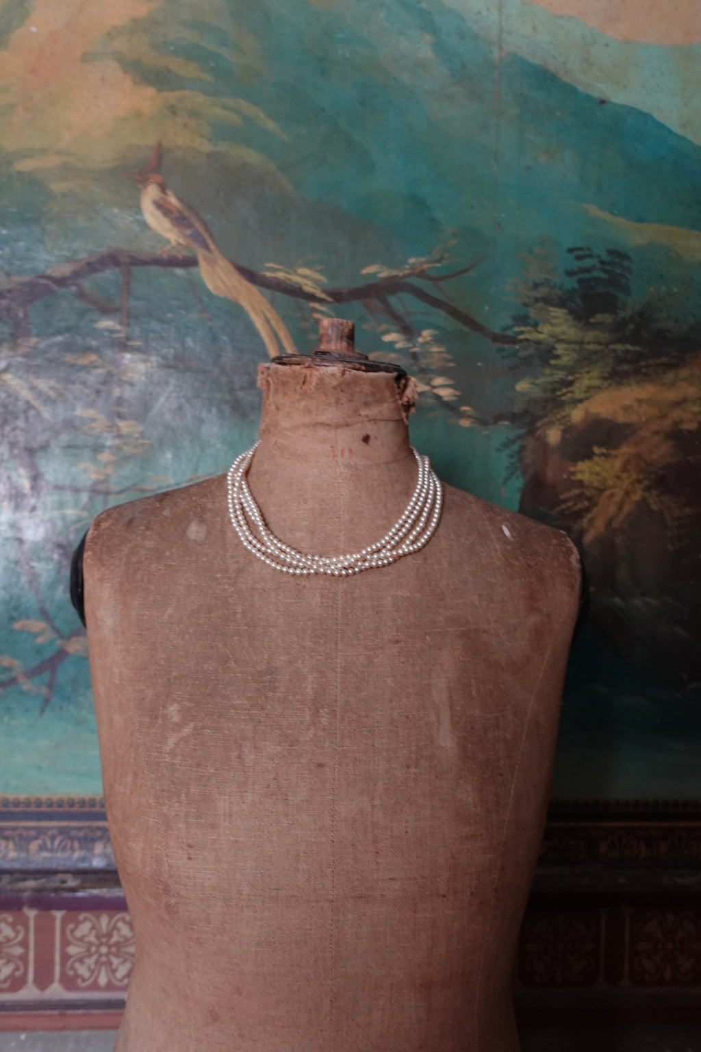 Vintage Triple-Strand Faux Pearl Choker with Gold Wing & Crystal Clasp